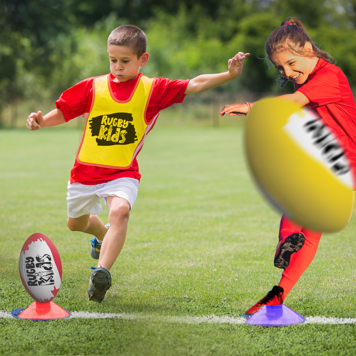 Children kicking rugby balls in a RugbyKids after-school club